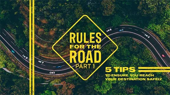 A winding road with a few cars on it. "Rules for the Road, Part 1" is shown with some additional text.