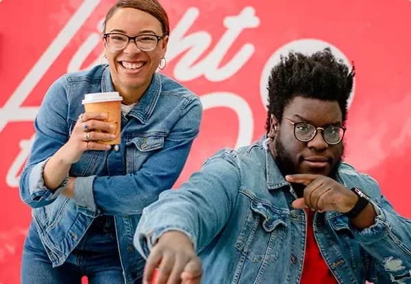 Two young adults posing for a photo at Local Vineyard Church