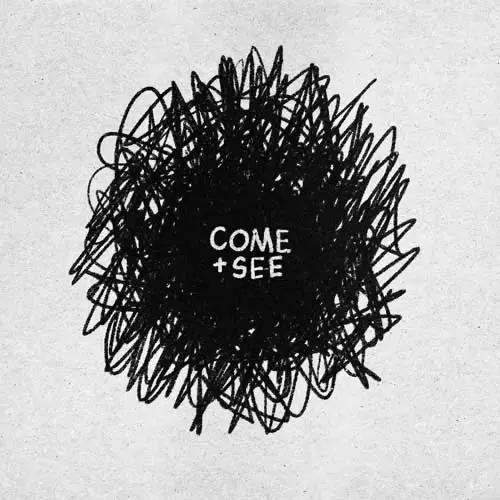 A black scribble taking up most of the screen with the words "Come and See" handwritten over it.