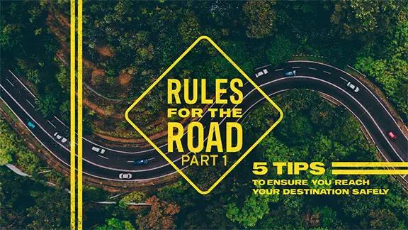 A winding road with a few cars on it. "Rules for the Road, Part 1" is shown with some additional text.