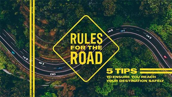 A winding road with a few cars on it. "Rules for the Road: 5 Tips to Ensure You Reach Your Destination Safely" is shown.