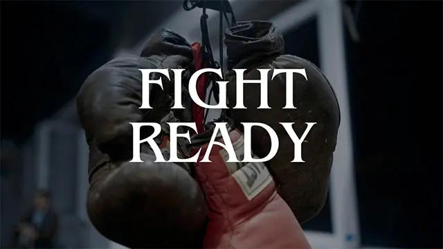 A pair of boxing gloves with the words "Fight Ready" above it