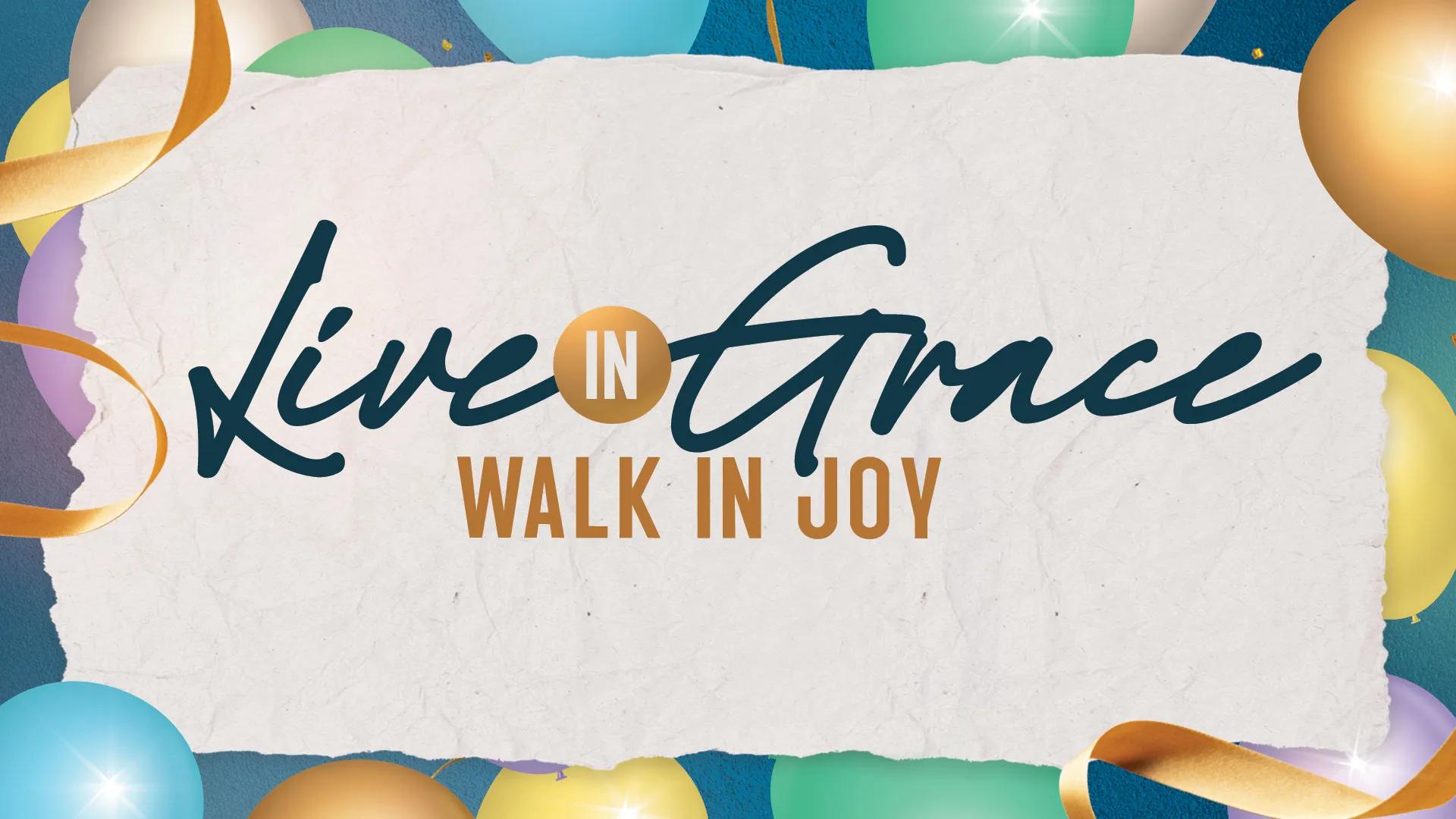 A backdrop full of balloons with the words "live in grace, walk in joy" written on a paper-like background.